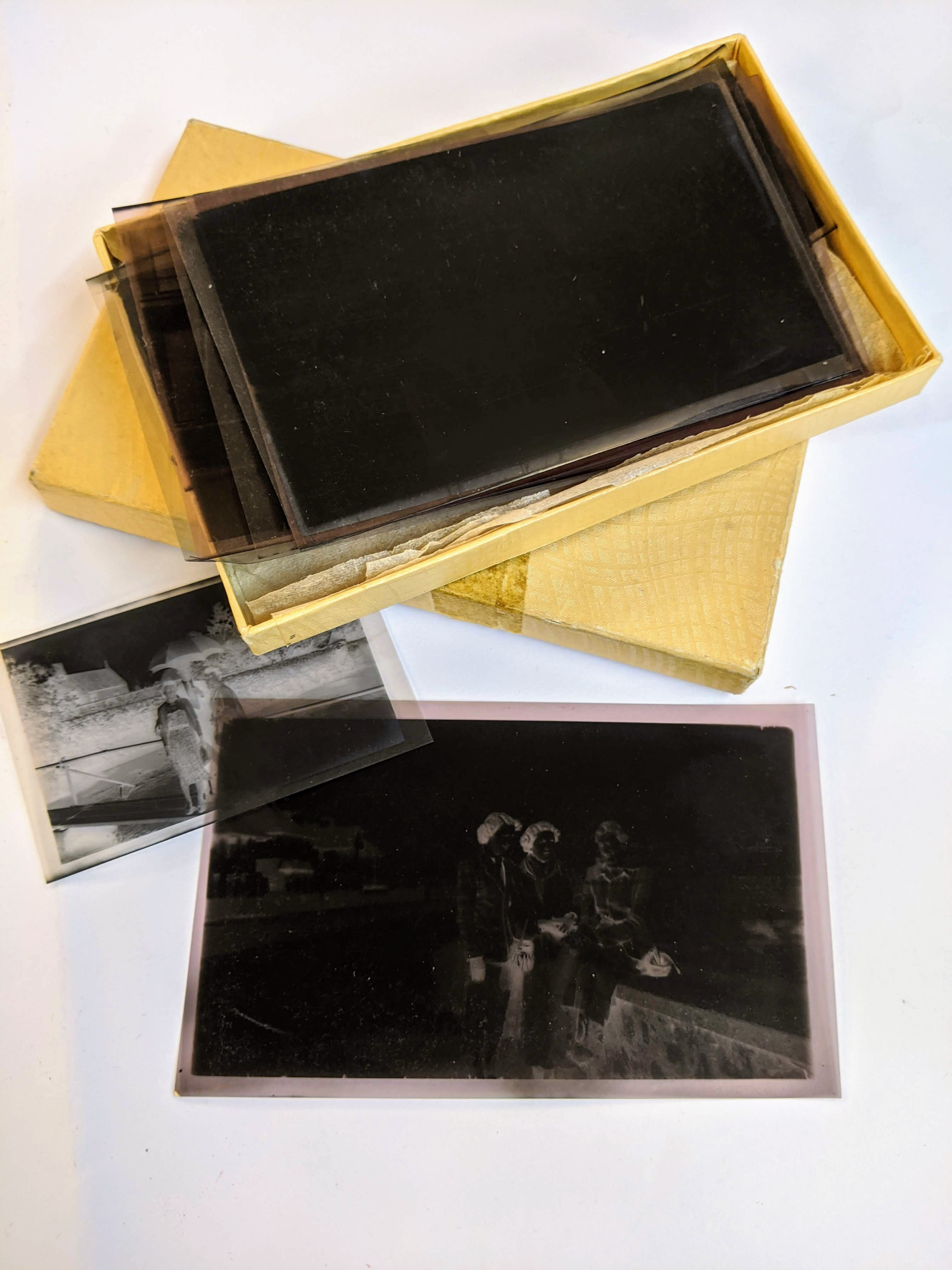 Glass photographic plates and negatives